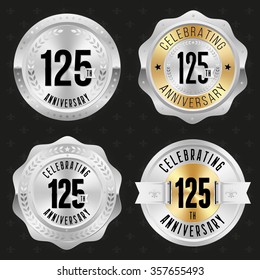 Collection of glossy silver 125th anniversary badges