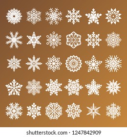 collection of golden vector snowflakes on white background