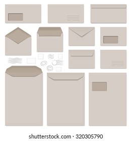 collection of gray envelopes, note papers and postage stamps