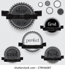 Collection of the gray labels with black ribbons on the gray background 