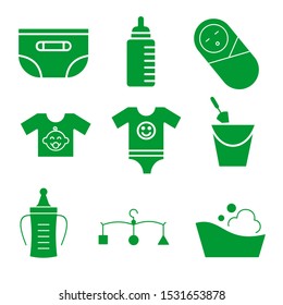 Collection of green baby elements. toys and clothes icon. baby care equipment with a white background. Vector illustration.