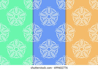 Collection of green, blue and orange floral ornaments. Set of vertical seamless patterns for wallpapers and fabrics. Vector illustration