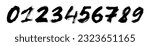 Collection grunge brush drawn numbers from 0 to 9. Graffiti style modern vector elements. Typographic distressed numbers with dry brush texture and rough edges. Hand drawn grunge symbols.