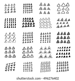 Collection of grunge pen triangles. Set of vector tribal scribbles. Quick ink sketches.