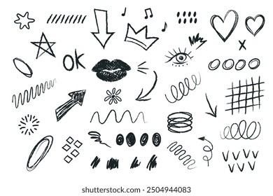 Collection of hand drawn black and white charcoal pencil doodles. Pencil or chalk sketch icons and abstract shapes of decorative design elements.