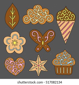 Collection of hand drawn cute colorful cookies with icing isolated on chalkboard background.