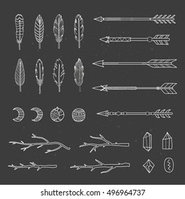 Collection of hand drawn indian boho feathers, arrows, twigs and crystals isolated on the blackboard. Can be used for wedding invitations, prints, coloring books for adults.