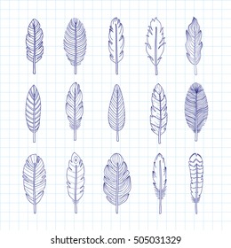Collection of hand drawn indian boho feathers isolated on graph paper background.