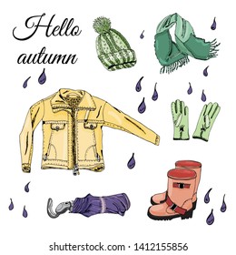Collection with hand drawn of items of autumn clothes and drops. Ink and colored sketch elements  isolated on white background. Vector illustration.