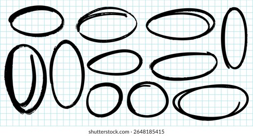collection of hand drawn oval and circle shapes in black marker on a blue grid paper background.