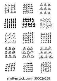 Collection of hand drawn triangles. Set of black and white geometric elements