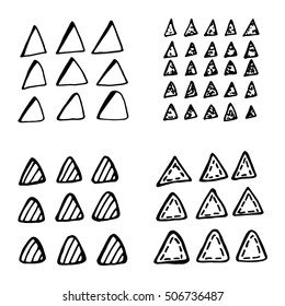 Collection of hand drawn triangles. Set of black and white geometric elements