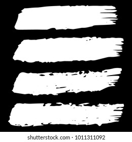 Collection of hand drawn white grunge brushes. Vector Grunge Brushes. Dirty Artistic Design Elements. Creative Design Elements. Banner. Black background with white stripes made with brush.