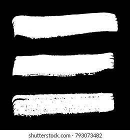 Collection of hand drawn white grunge brushes. Vector Grunge Brushes. Dirty Artistic Design Elements. Creative Design Elements. Banner. Black background with white stripes made with brush.