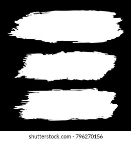 Collection of hand drawn white grunge brushes. Vector Grunge Brushes. Dirty Artistic Design Elements. Creative Design Elements. Banner. Black background with white stripes made with brush.