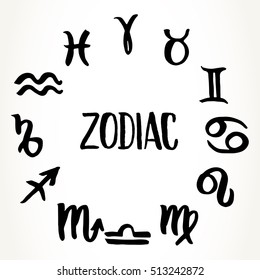 Collection of hand drawn zodiac signs forming a circle. Vector graphics astrology set. Rough brush illustration in black over white.