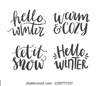 A collection of hand lettered winter phrases. Hello Winter, Warm & Cozy, Let in Snow. Set of vector hand drawn words. Designs for greeting cards, t shirts, social media.