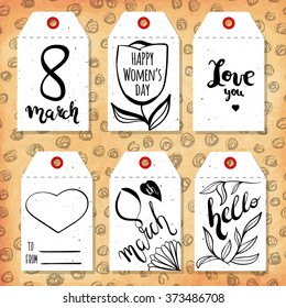 Collection handdrawn in the style of the lovely ready-made gift tags. Congratulations on the arrival of spring and March 8. Vector illustration