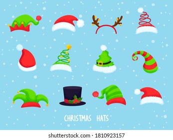 Collection of Сhristmas hats on blue background. Vector illustration in cartoon style. All elements are isolated. Great for prints, decor and web desig.