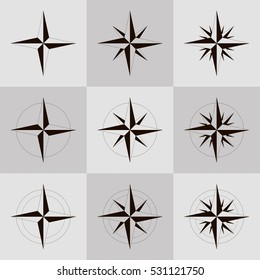 Collection of icons wind rose. Vector illustration. Black contour on a gray background.