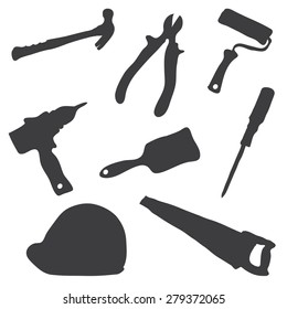 Collection of images of silhouettes of working tools on a white background