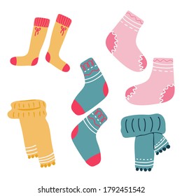 A collection of knitted socks, scarves, blankets, and pillows.