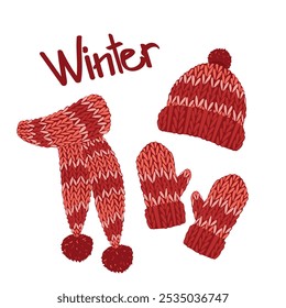A collection of knitted warm winter clothes. Winter hat, scarf, mittens. Autumn and winter accessories. Seasonal clothes.