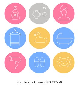 Collection of linear icons of items for bathroom such as bottle with liquid soap, bubbles, towel, swimming duck, bath, hair dryer, slippers and sponge. Linear icons in pink, yellow and blue circles.