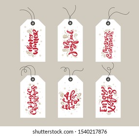 Collection of Merry Christmas vector gift tags with handwritten calligraphy lettering phrases text and bundle decorative xmas elements