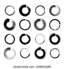 Collection of miscellaneous black grunge brush stroke round frames isolated over white background. Set of design elements. Vector illustration.