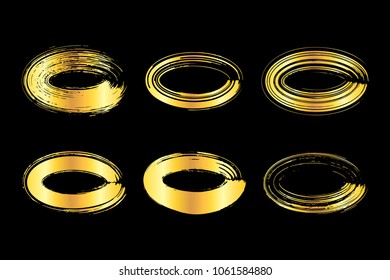 Collection of miscellaneous golden grunge brush stroke oval frames isolated over black background. Set of design elements. Vector illustration.