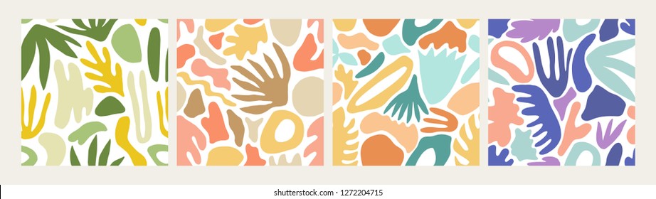 Collection of modern abstract seamless patterns with natural colorful shapes or blots on white background. Trendy motley vector illustration in flat style for wrapping paper, textile print, wallpaper.