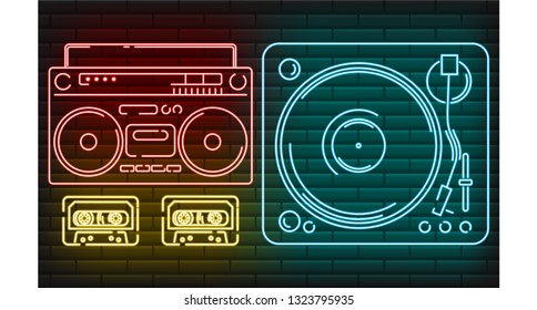 Collection of neon music sings: cassette player, bumbox, vinyl player and cassettes.  Retro Music neon symbols design elements. . Bright signboard, night advertising vector illustration