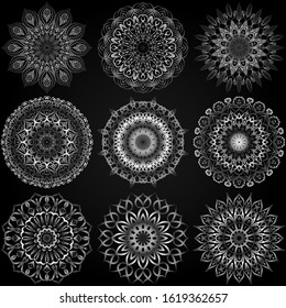 A collection of nine silver mandalas on a black background. Luxurious vector ornament.  