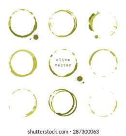Collection of olive round stains and blots on white background