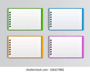 collection of open white notebooks