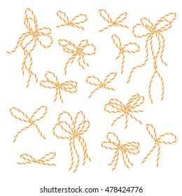 Collection of orange bakers twine bows on white background