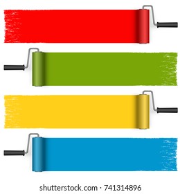 collection of paint rollers with painted markings in different colors