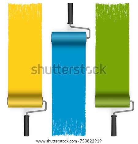 collection of paint rollers with painted markings in different colors