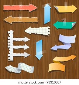 Collection paper arrows on wooden background.vector eps 10