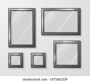 Collection of photo frames on the gray wall. Modern empty frame template with transparent glass and shadow. Vector illustration 