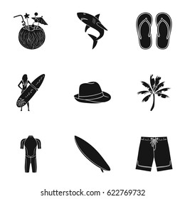 A collection of pictures on the theme of the beach, the sea, surfing. Rescuers of the beach.Surfing icon in set collection on black style vector symbol stock illustration.
