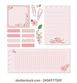 Collection of pink cherry blossoms with note paper, washi tape, paper clips