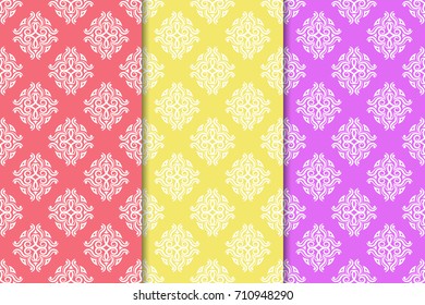 Collection of pink, yellow and violet floral ornaments. Set of vertical seamless patterns for wallpapers and fabrics. Vector illustration