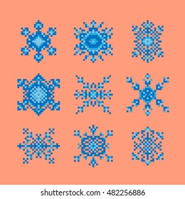 Collection of pixel art style snowflakes