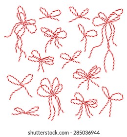 Collection of red bakers twine bows on white background