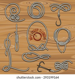 Collection of Rope Design elements. Drawn in vintage style. Knots, loops and hooks. Free font used.