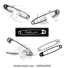 A collection of  safety pin sketches in vintage style. Vector isolated drawing.