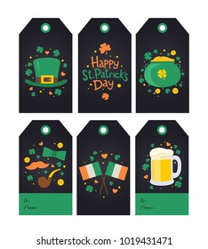 Collection of Saint Patrick's Day gift tags. Congratulatory inscription, Leprechaun's hat, pot of money and clover, beer mug, Ireland flag. Set for decoration of holiday gifts. Vector illustration.