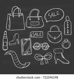 collection of sale time with women accessories using doodle art on chalkboard background